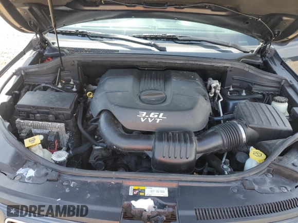 2014 Jeep Grand Cherokee Laredo with VIN 1C4RJEAGXEC160132, listed as a Copart auction lot 55599615 with 127,541 mi miles and Clean Title. Bid and sale history available at DreamBid. Image 12.