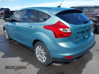 2012 Ford Focus SE with VIN 1FAHP3K24CL394495, listed as a IAAI auction lot 42034167 with 66,833 mi miles and . Bid and sale history available at carsss.com. Image 3.