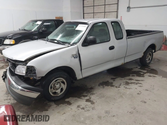 2002 Ford F-150 XL with VIN 1FTRX17W52NB23883, listed as a IAAI auction lot 41721680 with 144,115 mi miles. Bid and sale history available at carsss.com. Image 17.