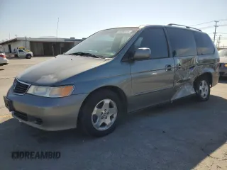 2000 Honda Odyssey EX with VIN 2HKRL1867YH526895, listed as a Copart auction lot 55889165 with 270,959 mi miles and Salvage title. Bid and sale history available at DreamBid. Image 1.