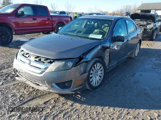 2010 Ford Fusion Hybrid with VIN 3FADP0L39AR125251, listed as a IAAI auction lot 41100606 with 235,612 mi miles. Bid and sale history available at carsss.com. Image 17.