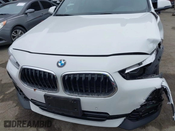 2022 BMW X2 sDrive28i z VIN WBXYH9C06N5U37719, wystawiony jako IAAI lot #42355050 z przebiegiem 33 127 mil mil oraz . Historia ofert i sprzedaży dostępna na DreamBid. Obrazek 6.
