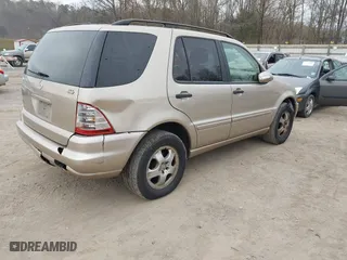 2002 Mercedes-Benz M-Class with VIN 4JGAB54E82A308902, listed as a IAAI auction lot 41779482 with 99,933 mi miles. Bid and sale history available at carsss.com. Image 4.