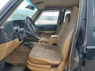 1998 Jeep Cherokee Sport with VIN 1J4FJ68S6WL188802, listed as a Copart auction lot 52094005 with 199,586 mi miles and Salvage Title. Bid and sale history available at carsss.com. Image 7.