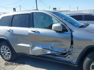 2021 Jeep Grand Cherokee Laredo E with VIN 1C4RJEAG6MC719089, listed as a IAAI auction lot 39290041 with 44,726 mi miles and . Bid and sale history available at DreamBid. Image 13.