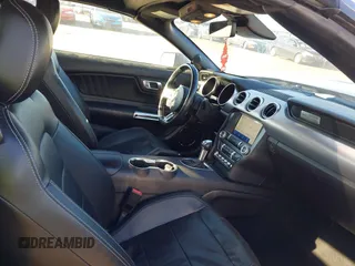2021 Ford Mustang EcoBoost z VIN 1FATP8UH3M5105279, wystawiony jako IAAI lot #41712821 z przebiegiem 99 760 mil mil oraz . Historia ofert i sprzedaży dostępna na DreamBid. Obrazek 5.