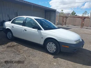 1998 Saturn SL with VIN 1G8ZF5285WZ243548, listed as a IAAI auction lot 41659710 with 109,099 mi miles. Bid and sale history available at carsss.com. Image 1.