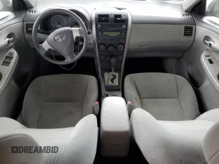 2010 Toyota Corolla with VIN 1NXBU4EE8AZ187793, listed as a Copart auction lot 63909235 with 65,164 mi miles and Salvage title. Bid and sale history available at DreamBid. Image 8.