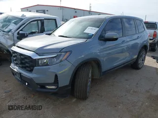 2023 Honda Passport EX-L with VIN 5FNYF8H52PB027082, listed as a IAAI auction lot 41788783 with 32,186 mi miles and . Bid and sale history available at carsss.com. Image 2.