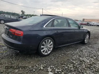 2018 Audi A8 with VIN WAU44AFD0JN000152, listed as a Copart auction lot 62844254 with 47,325 mi miles and Salvage title. Bid and sale history available at DreamBid. Image 3.