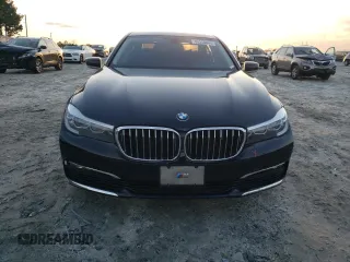 2017 BMW 7 Series 740i xDrive with VIN WBA7E4C55HGU99795, listed as a Copart auction lot 85545124 with 99,304 mi miles and Salvage Title. Bid and sale history available at carsss.com. Image 5.
