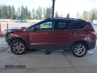 2018 Ford Escape SEL with VIN 1FMCU9HD0JUC36389, listed as a IAAI auction lot 41997627 with 96,739 mi miles. Bid and sale history available at carsss.com. Image 15.