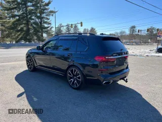 2019 BMW X7 xDrive50i z VIN 5UXCX4C53KLB39548, wystawiony jako Copart lot #54152375 z przebiegiem 159 191 mil mil oraz Czysty tytuł • Clean title. Historia ofert i sprzedaży dostępna na DreamBid. Obrazek 3.