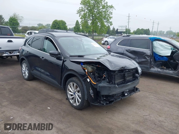 2021 Ford Escape Titanium Hybrid with VIN 1FMCU9DZ5MUA18079, listed as a IAAI auction lot 42340093 with 71,630 mi miles and . Bid and sale history available at DreamBid. Image 1.