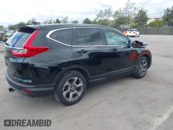 2019 Honda CR-V EX with VIN 5J6RW1H56KA030445, listed as a IAAI auction lot 42043513 with 137,087 mi miles. Bid and sale history available at carsss.com. Image 4.