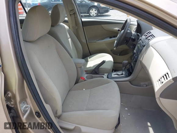 2010 Toyota Corolla with VIN 1NXBU4EE8AZ214135, listed as a IAAI auction lot 42522421 with 72,726 mi miles and . Bid and sale history available at DreamBid. Image 5.