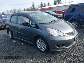 2011 Honda Fit Sport z VIN JHMGE8H54BC000162, wystawiony jako IAAI lot #41665321 z przebiegiem 154 531 mil mil oraz . Historia ofert i sprzedaży dostępna na DreamBid. Obrazek 1.