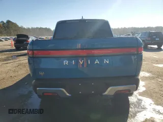 2022 Rivian R1T Launch Edition z VIN 7FCTGAAL7NN000539, wystawiony jako Copart lot #87811245 z przebiegiem Nie podano mil oraz Szkody całkowita. Historia ofert i sprzedaży dostępna na DreamBid. Obrazek 6.