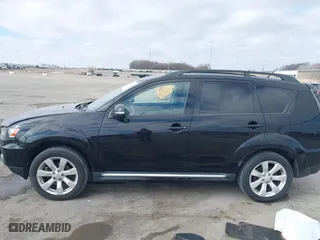 2010 Mitsubishi Outlander XLS with VIN JA4JT4AX6AZ002549, listed as a IAAI auction lot 41669290 with 136,757 mi miles. Bid and sale history available at carsss.com. Image 14.