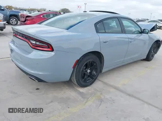 2021 Dodge Charger SXT with VIN 2C3CDXBG3MH536483, listed as a IAAI auction lot 41777952 with 83,435 mi miles and . Bid and sale history available at DreamBid. Image 4.
