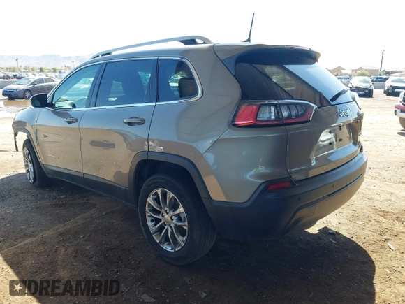 2021 Jeep Cherokee Altitude with VIN 1C4PJLLBXMD155096, listed as a IAAI auction lot 41746319 with 99,423 mi miles and . Bid and sale history available at DreamBid. Image 3.