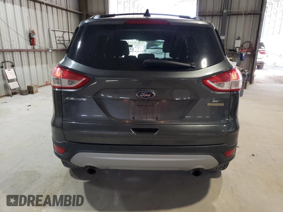 2016 Ford Escape SE with VIN 1FMCU0GX4GUC35861, listed as a Copart auction lot 51901375 with 140,193 mi miles and Salvage Title. Bid and sale history available at carsss.com. Image 6.