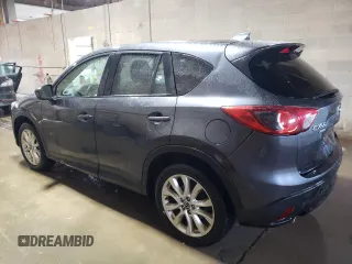 2015 Mazda CX-5 Grand Touring with VIN JM3KE4DY1F0454713, listed as a Copart auction lot 48548285 with 132,454 mi miles and Salvage Title. Bid and sale history available at DreamBid. Image 2.
