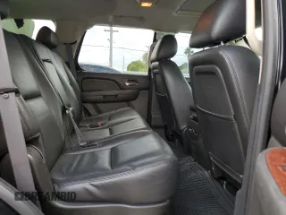 2010 Chevrolet Tahoe LTZ with VIN 1GNUKCE01AR127365, listed as a Copart auction lot 60711715 with 151,962 mi miles and Salvage title. Bid and sale history available at DreamBid. Image 11.
