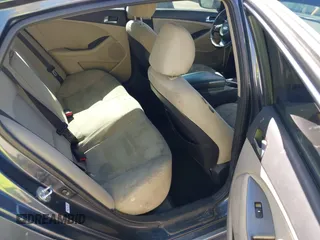 2014 Kia Optima LX with VIN KNAGM4AD7E5065723, listed as a IAAI auction lot 42551879 with 106,206 mi miles and . Bid and sale history available at DreamBid. Image 8.