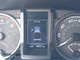 2021 Toyota Tacoma SR z VIN 3TYCZ5AN7MT008274, wystawiony jako IAAI lot #42091508 z przebiegiem 59 371 mil mil oraz . Historia ofert i sprzedaży dostępna na DreamBid. Obrazek 16.