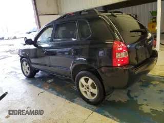 2005 Hyundai Tucson GL with VIN KM8JM12BX5U205060, listed as a Copart auction lot 71282644 with 243,076 mi miles and Salvage Title. Bid and sale history available at carsss.com. Image 2.