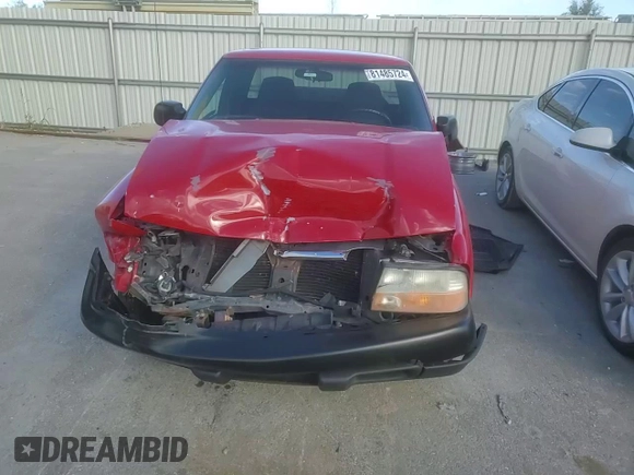 2003 GMC Sonoma SLS z VIN 1GTCS19X538165030, wystawiony jako Copart lot #81485724 z przebiegiem Nie podano mil oraz Szkoda całkowita • Salvage title. Historia ofert i sprzedaży dostępna na DreamBid. Obrazek 11.
