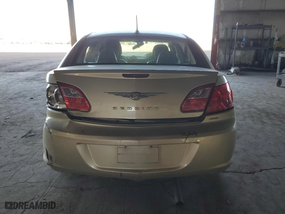 2010 Chrysler Sebring Limited with VIN 1C3CC5FD2AN190727, listed as a Copart auction lot 77809954 with 122,455 mi miles and Salvage Title. Bid and sale history available at carsss.com. Image 6.