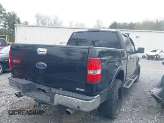 2005 Ford F-150 XLT with VIN 1FTPW14505FA88819, listed as a IAAI auction lot 41853524 with 227,414 mi miles. Bid and sale history available at carsss.com. Image 4.