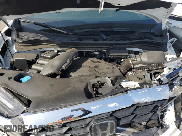 2023 Honda Passport EX-L with VIN 5FNYF8H58PB014241, listed as a Copart auction lot 55176105 with 16,672 mi miles and Salvage title. Bid and sale history available at DreamBid. Image 12.