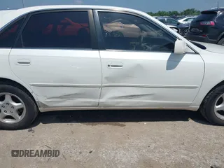 2001 Toyota Avalon XL z VIN 4T1BF28B91U183347, wystawiony jako IAAI lot #42441956 z przebiegiem 310 167 mil mil oraz . Historia ofert i sprzedaży dostępna na DreamBid. Obrazek 6.