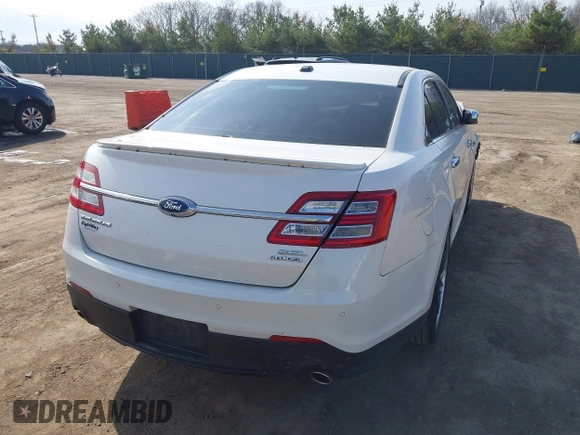 2015 Ford Taurus SEL z VIN 1FAHP2E86FG202386, wystawiony jako IAAI lot #42061925 z przebiegiem 123 475 mil mil oraz . Historia ofert i sprzedaży dostępna na DreamBid. Obrazek 4.