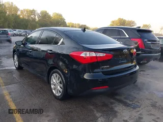 2014 Kia Forte EX with VIN KNAFX4A8XE5121630, listed as a IAAI auction lot 40517819 with 144,087 mi miles. Bid and sale history available at carsss.com. Image 3.