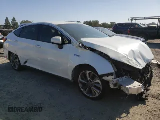 2018 Honda Clarity Touring z VIN JHMZC5F33JC002904, wystawiony jako Copart lot #55535325 z przebiegiem Nie podano mil oraz Szkoda całkowita • Salvage title. Historia ofert i sprzedaży dostępna na DreamBid. Obrazek 4.