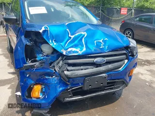 2019 Ford Escape S with VIN 1FMCU0F76KUB60154, listed as a IAAI auction lot 42508603 with 53,003 mi miles and . Bid and sale history available at DreamBid. Image 6.