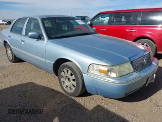 2005 Mercury Grand Marquis LS Premium z VIN 2MEFM75W75X664470, wystawiony jako IAAI lot #41960637 z przebiegiem 191 600 mil mil oraz . Historia ofert i sprzedaży dostępna na DreamBid. Obrazek 1.