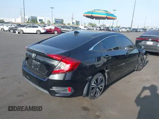 2016 Honda Civic EX-L with VIN 2HGFC1F79GH659164, listed as a IAAI auction lot 42455097 with 166,157 mi miles and . Bid and sale history available at DreamBid. Image 4.