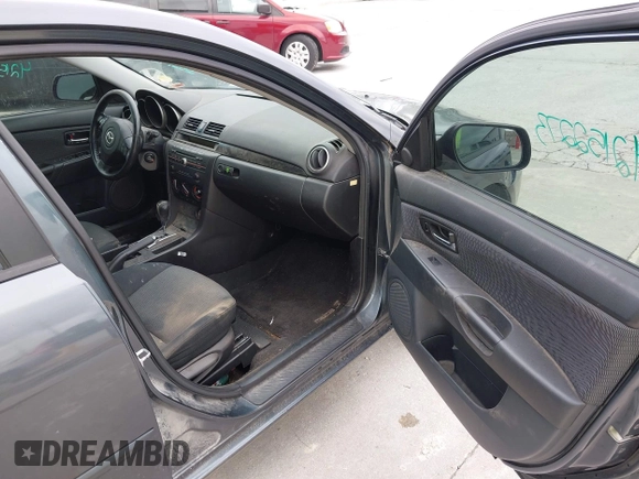 2009 Mazda Mazda3 i Touring Value with VIN JM1BK32F691204055, listed as a IAAI auction lot 42152273 with 252,960 mi miles. Bid and sale history available at carsss.com. Image 5.