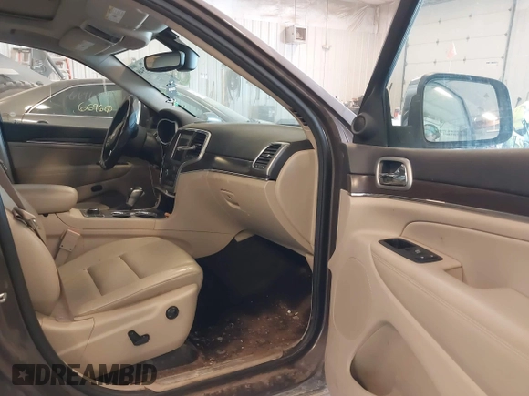 2018 Jeep Grand Cherokee Limited with VIN 1C4RJFBG9JC268479, listed as a IAAI auction lot 42032948 with 106,077 mi miles and . Bid and sale history available at DreamBid. Image 5.