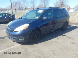 2007 Toyota Sienna XLE with VIN 5TDZK22C07S056161, listed as a IAAI auction lot 41820123 with 206,675 mi miles. Bid and sale history available at carsss.com. Image 2.