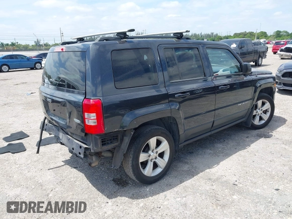 2014 Jeep Patriot Latitude with VIN 1C4NJPFA4ED604145, listed as a IAAI auction lot 42091619 with 81,119 mi miles and . Bid and sale history available at carsss.com. Image 4.