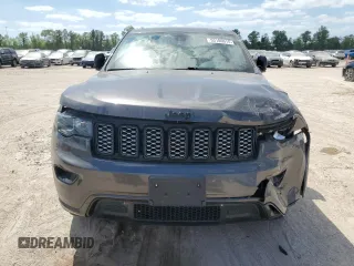 2021 Jeep Grand Cherokee Laredo E with VIN 1C4RJEAG5MC543796, listed as a Copart auction lot 53106015 with 69,193 mi miles and Salvage title. Bid and sale history available at DreamBid. Image 5.
