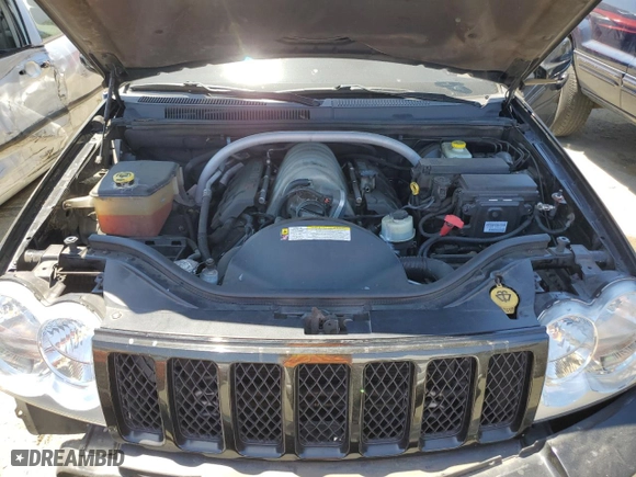 2007 Jeep Grand Cherokee SRT-8 with VIN 1J8HR78387C603473, listed as a Copart auction lot 57712964 with 114,429 mi miles and Salvage Title. Bid and sale history available at carsss.com. Image 12.