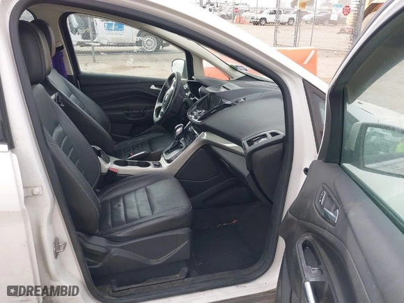 2013 Ford C-Max Hybrid SEL with VIN 1FADP5BU7DL544628, listed as a IAAI auction lot 41583426 with 230,761 mi miles. Bid and sale history available at carsss.com. Image 5.