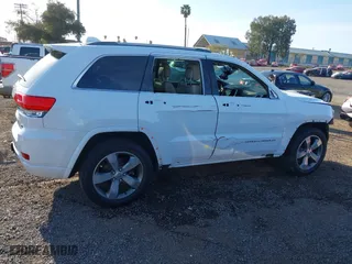 2014 Jeep Grand Cherokee Overland with VIN 1C4RJFCG8EC162271, listed as a IAAI auction lot 41827017 with 183,447 mi miles. Bid and sale history available at carsss.com. Image 14.